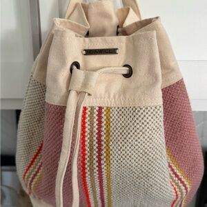 O’Neal women’s handbag with drawstring and straps for backpack carry .
